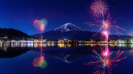 Fireworks over mountain and lake for Chichibu festival, Japan