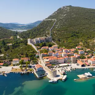 Aerial view of Mali Ston medieval old town and fortified wall in Croatia