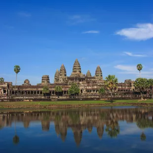 Angkor Wat temple complex being reflected in the water in Cambodia, Southern Asia