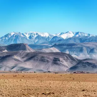 Panoramic view of the Atlas Mountains and it's white peaks in Morocco