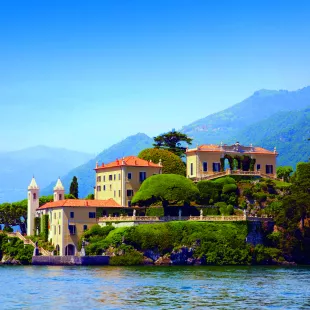 View of Villa del Balbianello building from Lake Como in Italy