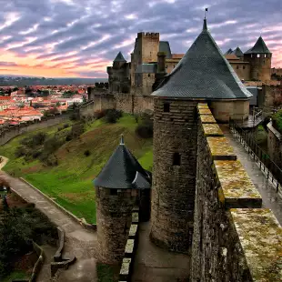 Fortress Cité de Carcassonne battlement walls overlooking the city in Aude, France