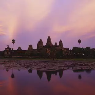 A distant view of Angkor Wat, a temple complex in Cambodia, at twilight