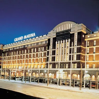 Exterior of Scandic Grand Marina under a clear evening sky