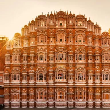 Hawa Mahal, five story sandstone palace featuring windows in a honeycomb-like fashion