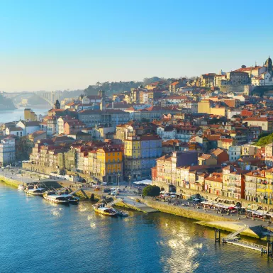 Aerial skyline shot of the colourful buildings in Porto Old Town in sunset light, Portugal.