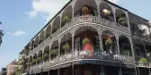 Exterior of the LaBranche House, traditional new orleans building featuring long balconies 