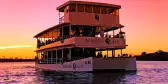 Exterior sunset view of African Queen triple-decker ship at Victoria Falls in Zambia, South Africa