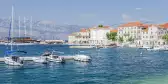 View of the old town of Postira and harbour with boats in Croatia