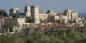 White, medieval gothic building of Palace of the Popes in Avignon, France