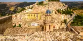 Ragusa Ibla village in broad daylight under a clear sky, Italy