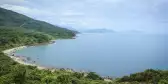 Misty view of the East Sea from Son Tra Mountain's shoreline, Vietnam