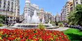 Town Hall Square with flowers and water fountain in Valencia, Spain