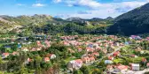 Aerial shot of country houses in Cetinje city, Montenegro