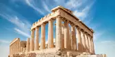 The Parthenon, a white marble temple on a bright day in Athens, Greece