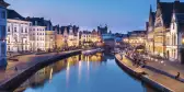 Medieval buildings overlooking harbour on Leie river in Ghent town, Belgium