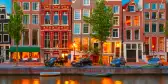 Traditional Dutch houses overlooking Herengracht canal in Holland, Netherlands