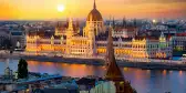 Parliament on riverbank of Danube at sunrise in Budapest, Hungary