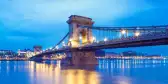 Czechenyi Chain Bridge in Budapest, Hungary, early in the morning. Focus on the bridge. Panorama photo,