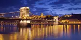 View of Budapest and chain bridge over the Danube river during twilight blue hour in Hungary