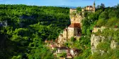 Rocamadour medieval town with lush vegetation in Lot, France