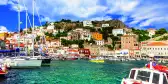 View of port with colourful boats on Hydra island in Saronic, Greece