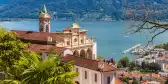 Madonna del Sasso in Switzerland, a site of pilgrimage, with a background of Lake Orta.