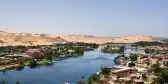 River Nile in Egypt with distant views of the desert sands