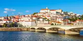 View of Coimbra city from the Mondego River in Portugal