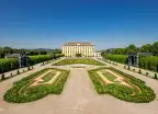 Schloss Schonbrunn Kronprinzengarten - manicured gardens in front of a grand house, Vienne, Austria