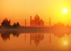 Taj Mahal at dusk with beautiful orange sky in India