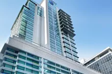 Exterior street view of the Coast Coal Harbour Vancouver Hotel by APA