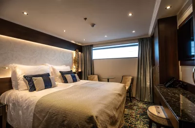 Interior of double bedroom cabin aboard the George Eliot ship