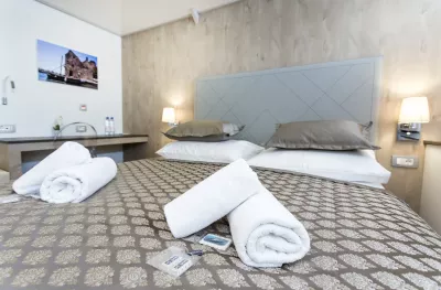 Close-up of towels on bed inside cabin aboard the MS Adriatic Sun ship