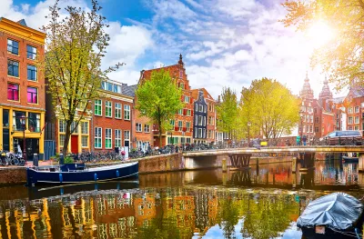 Netherlands houses overlooking the river Amstel canal in Amsterdam