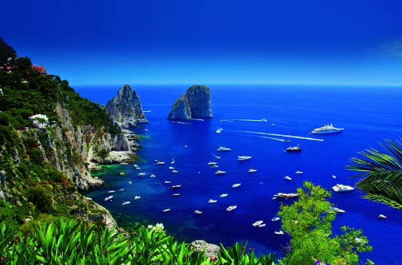 View of ocean and boats from Giardini di Augusto in Capri