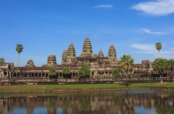 Angkor Wat temple complex being reflected in the water in Cambodia, Southern Asia