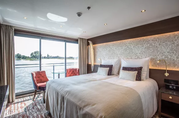 Interior shot of bedroom aboard the Oscar Wilde cruise ship