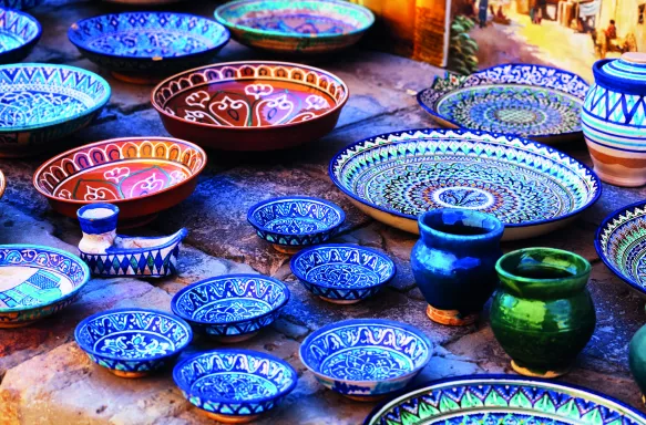 Plates and pots on a street market in the city of Bukhara, Uzbekistan