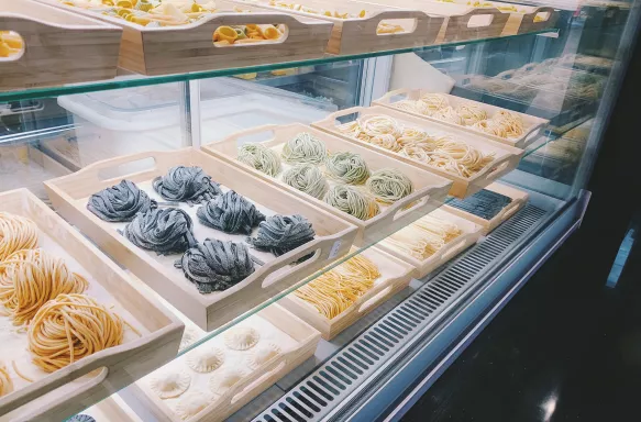 Traditional Italian colourful pasta in glass window display