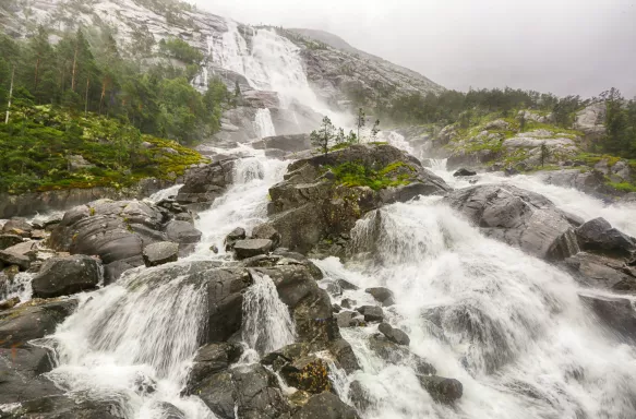 Waterfall Langfoss located on the lake Stordalsvatnet, Norway