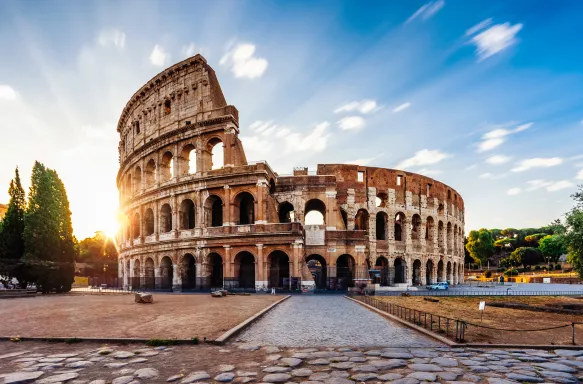 Colosseum in Rome during sunrise in Italy