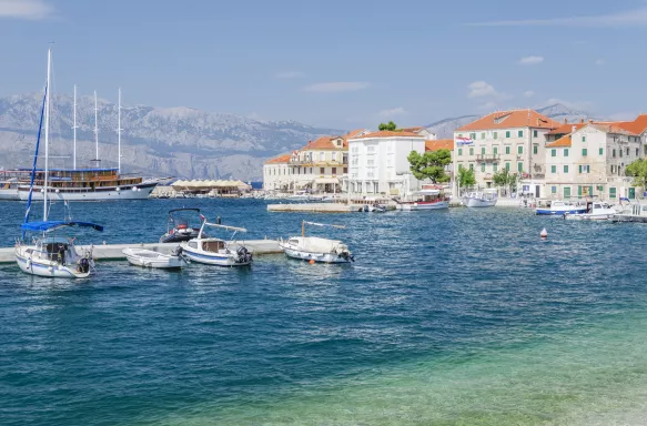 View of the old town of Postira and harbour with boats in Croatia