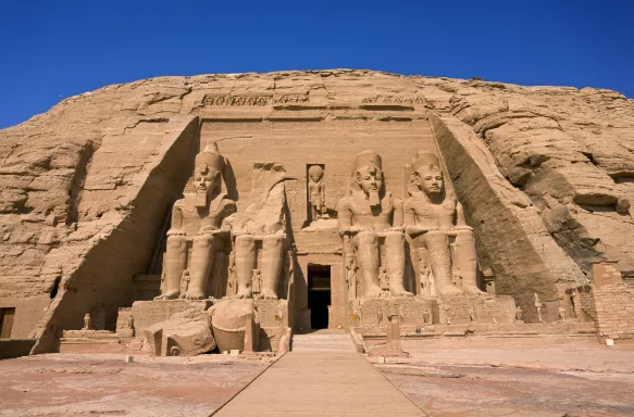 Entrance to the Great Temple of Abu Simbel, a rock-cut temple featuring four stone figures