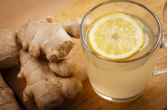 Close-up of ginger tea with lemon and fresh ginger