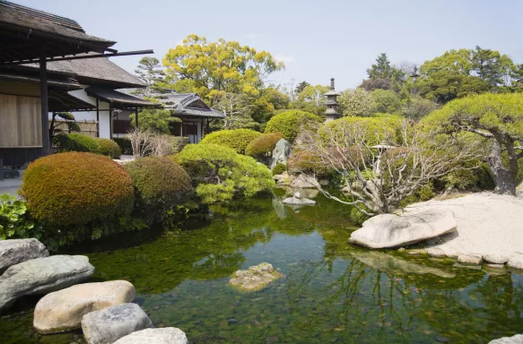 Korakuen Garden with ponds and Japanese style buildings in Okayama, Japan