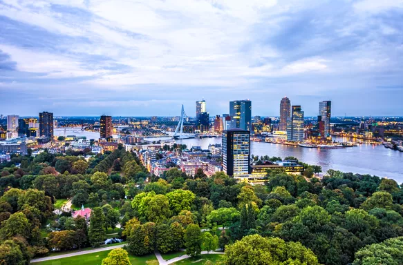 Skyline view of Rotterdam City at dusk in South Holland