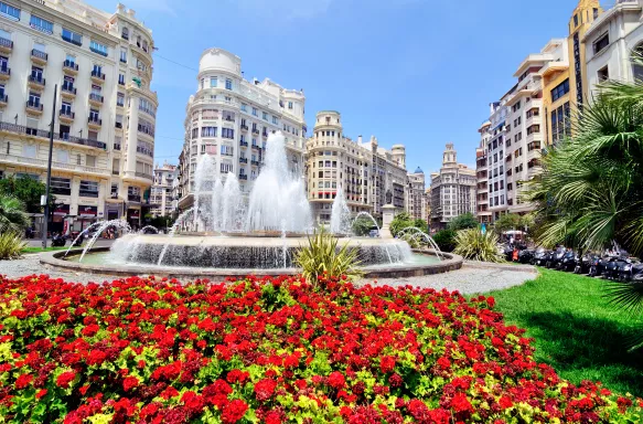 Town Hall Square with flowers and water fountain in Valencia, Spain