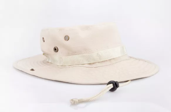 Beige safari adventure hat against a white background