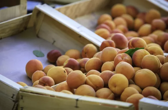 Fresh peaches at a street market in a small French town, Provence.